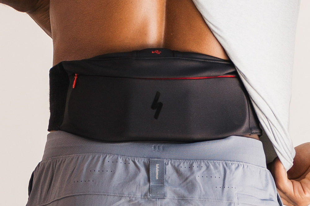Close view of the Infraway L1 wrapped across the lower back, worn under a shirt